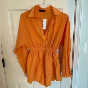 Urban outfitters romper - orange (size medium) never worn/ tags on